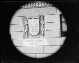 University Club seal on building wall.