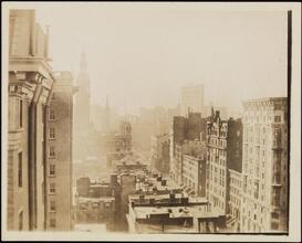 [Madison Avenue looking south from 29th Street with views of rooftops.]