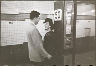 Life and Love on the New York City Subway [Couple on subway platform.]