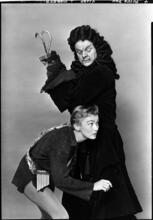 [Veronica Lake as Peter Pan and Lawrence Tibbett as Captain Hook.]