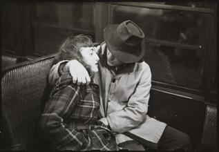 Life and Love on the New York City Subway [Couple sleeping on a subway.]