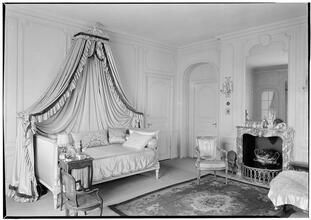 Faris R. Russell [residence]. Bedroom to bed and fireplace.