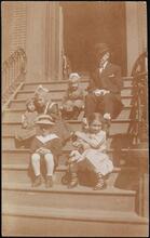 [Children on a stoop.]