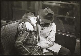 Life and Love on the New York City Subway [Couple on a subway.]