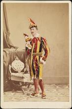 [August Belmont, Jr. in costume for a fancy dress ball.]