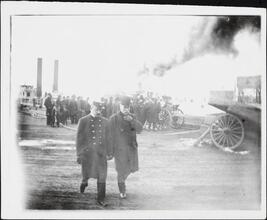 [Firemen at scene of fire.]