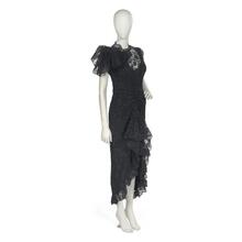 Evening dress in black lace and black paillettes