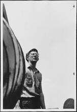 [Crew member on the ferry.]