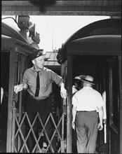 [Conductor on an elevated railroad.]