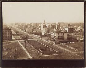[View from the roof of George Ehret's home at Park Avenue and 94th Street.] Looking west. Shows the Metropolitan Museum of Art [and Cleopatra's Needle] and the 86th Street Station of Harlem Division o