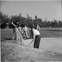 Arthur Godfrey [Godfrey golfing.]