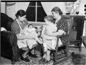 [Women holding small children.]