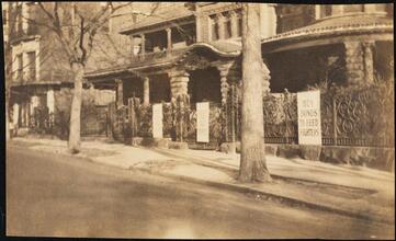 Street Scenes, etc. Showing Displays of Liberty Loan Posters during World War I [Liberty Loan posters attached to a fence on Riverside Drive and 90th Street.]