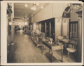 [Interior, clothing store.]