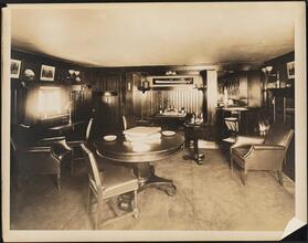 [Interior, study with small bar.]