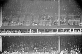Football Writers [Fans in the stadium.]