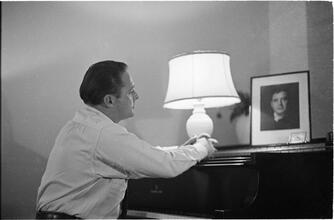 Christopher Lynch [Christopher Lynch, Irish tenor, at a piano.]