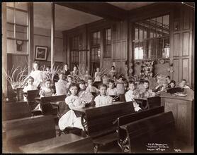 One Way of bringing the Children into Camp: Basket-weaving in Vacation School.