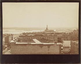 [View from the roof of George Ehret's home at Park Avenue and 94th Street.] Looking east by south. Looking east on 94th Street showing 2nd and 3rd Avenue Els. Also Hell Rock. On the right Ehret's brew