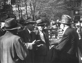 Untitled [Men in left-wing political discussion, Union Square]