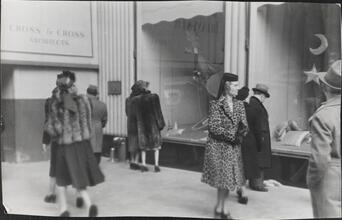 [People window shopping on 5th Avenue.]