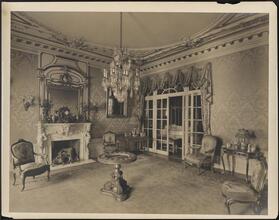 [Residence. Interior, parlor.]