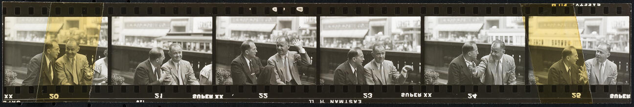 Bronx Street Scene [Two men talking.]