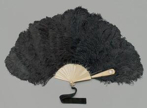Folding feather fan of black ostrich with watch