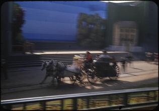 [Horse-drawn hose carriage in a scene of Parade of Railroads.]