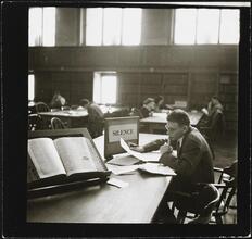 Columbia University [Students studying in Butler Library.]