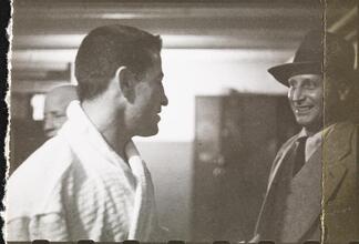 Rocky Graziano, He's a Good Boy Now [Rocky Graziano with a man.]