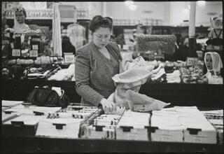 The 5 and 10 [Woman shopping at Woolworth's.]