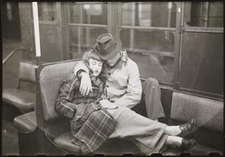 Life and Love on the New York City Subway [Couple sleeping on a subway.]