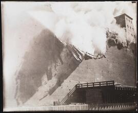 [Building on fire.]