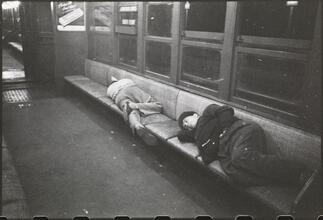 Life and Love on the New York City Subway [Men sleeping in a subway car.]