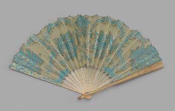 Folding fan of blue silk on cream net leaf