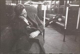 Life and Love on the New York City Subway [Men sleeping in a subway car.]