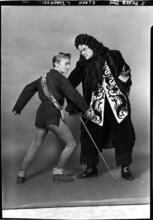 [Veronica Lake as Peter Pan and Lawrence Tibbett as Captain Hook.]