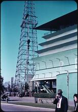 [Petroleum Building and a replica of an oil derrick.]