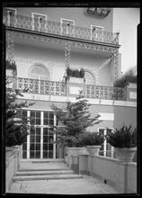 Cosmopolitan Club. Detail of rear balconies from causeway.