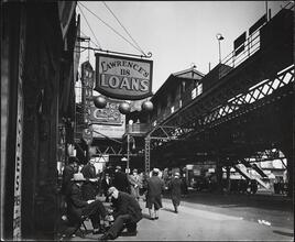 [Elevated railroad and street scene.]