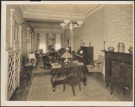 [Residence. Interior, parlor.]