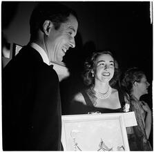Art by Celebrities Sponsored by the Urban League [Man and woman holding a painting.]