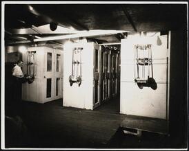 [Interior, film processing.]