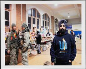 A member of the coalition of United Sikhs, brings food to Francis de Sales Church in Far Rockaway. Queens