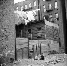 Wooden Rear Tenements -- Children Playing in Dirt