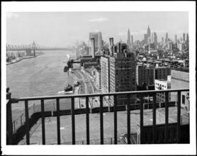 [Balcony overlooking the Queensboro Bridge and Midtown Manhattan skyline.]