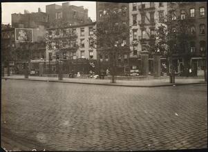 Street Scenes, etc. Showing Displays of Liberty Loan Posters during World War I [Liberty Loan signs on a fence of a park on Kenmare Street.]