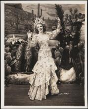 [Chorus girl in "Boys and Girls Together".]