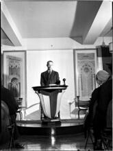 [Man at pulpit.]